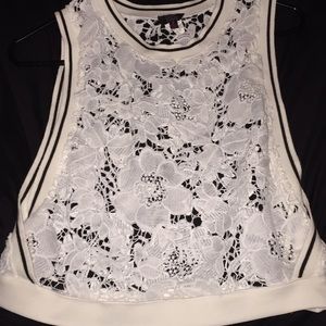 A white flower shirt that is see through